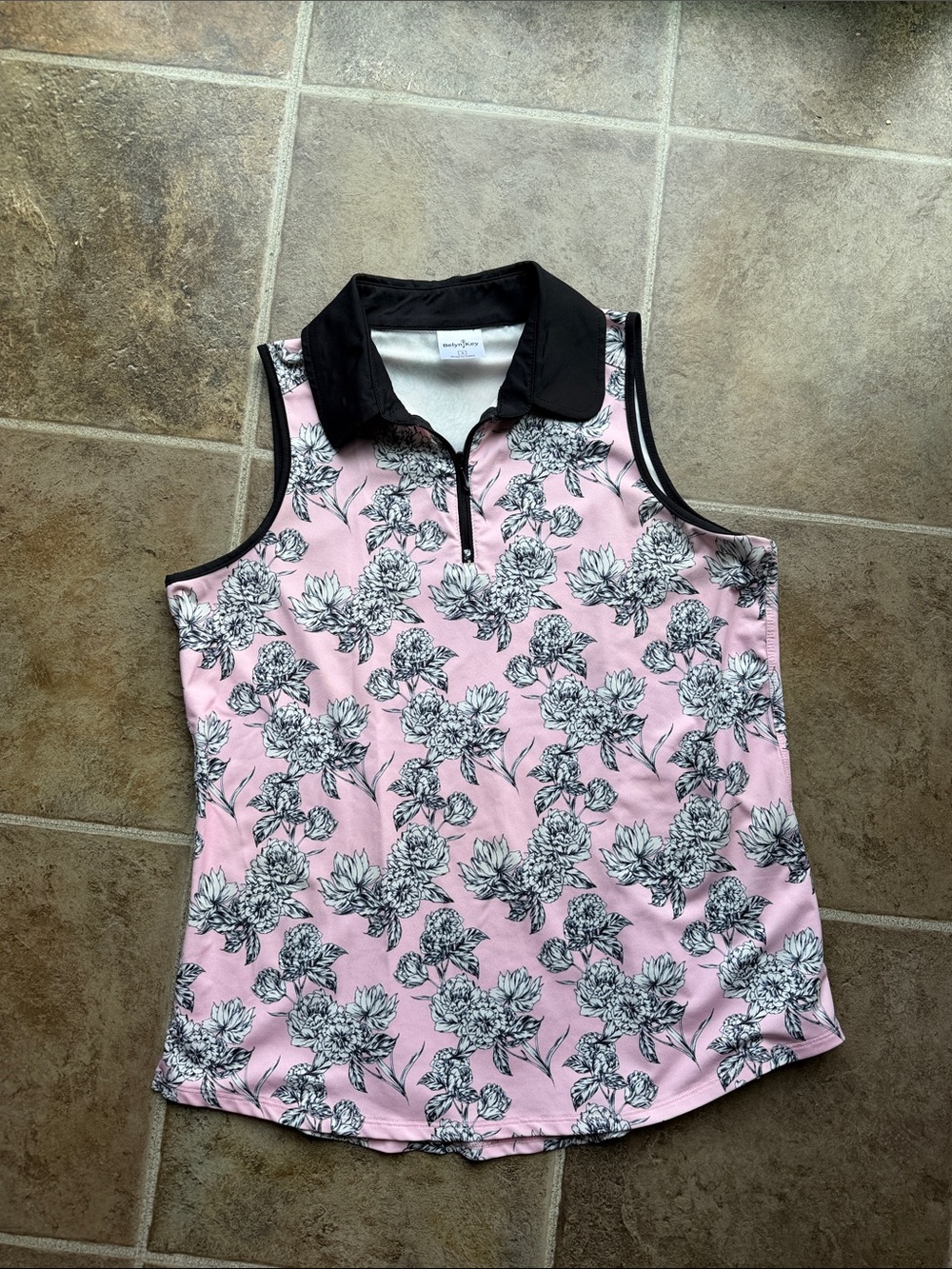 Belyn Key Pink Floral Sleeveless Polo with Black Trim